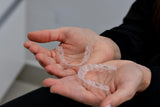 hands holding nighttime aligners