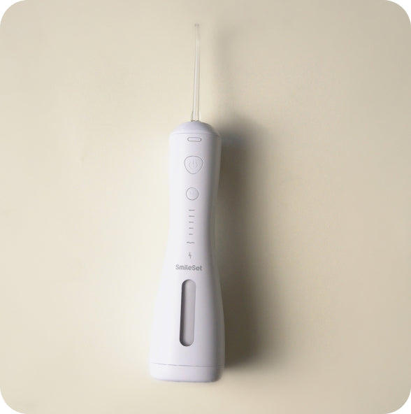 White SmileSet Handheld Water Flosser