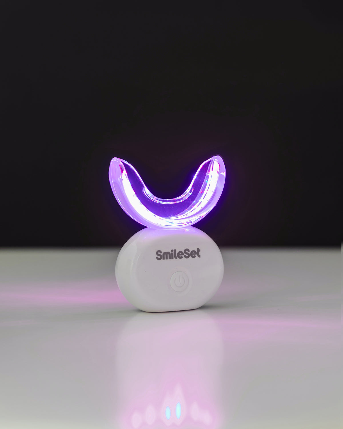 SmileSet LED whitening tray glowing violet
