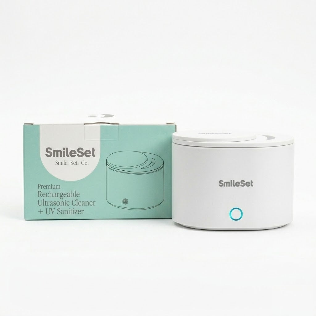 White SmileSet rechargeable ultrasonic cleaner with its box