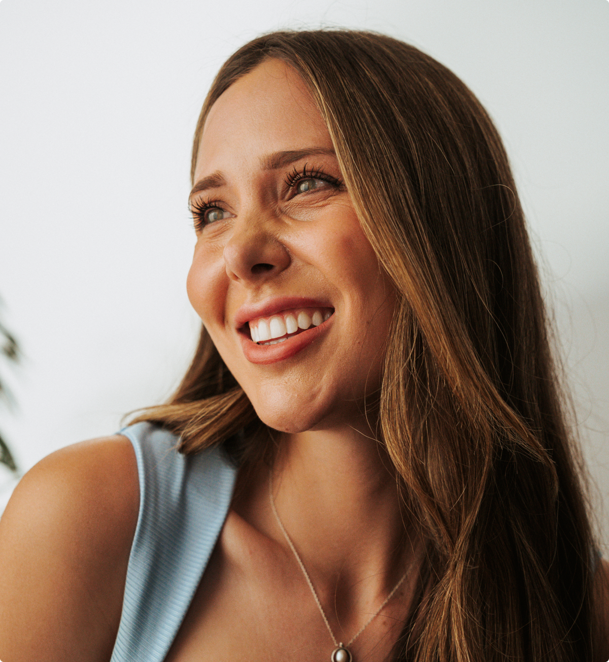 Smiling woman with straight teeth