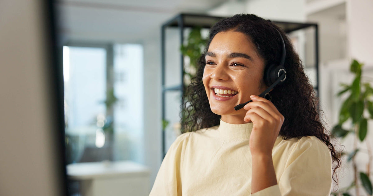 Woman wearing a headset in an office setting